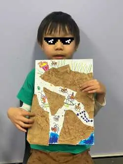 child showing art